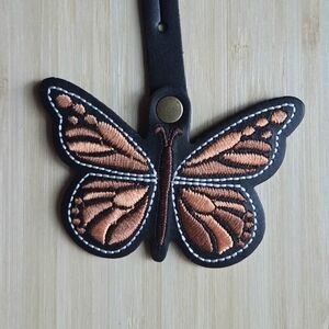 Portland Leather Monarca Butterfly Bag Charm Tassel in Black